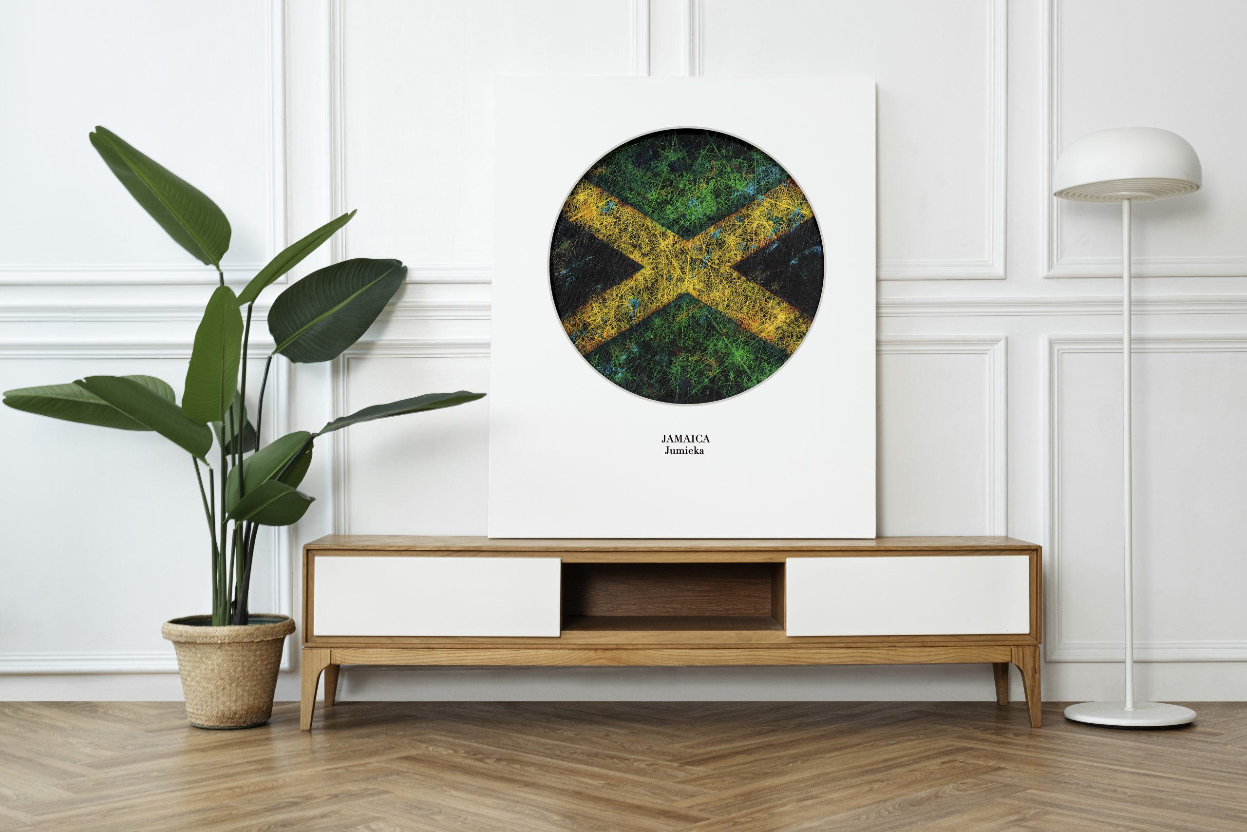 Framed Flag of Jamaica poster on a cabinet with Scandinavian home interior Framed Flag of Jamaica poster on a cabinet with Scandinavian home interior