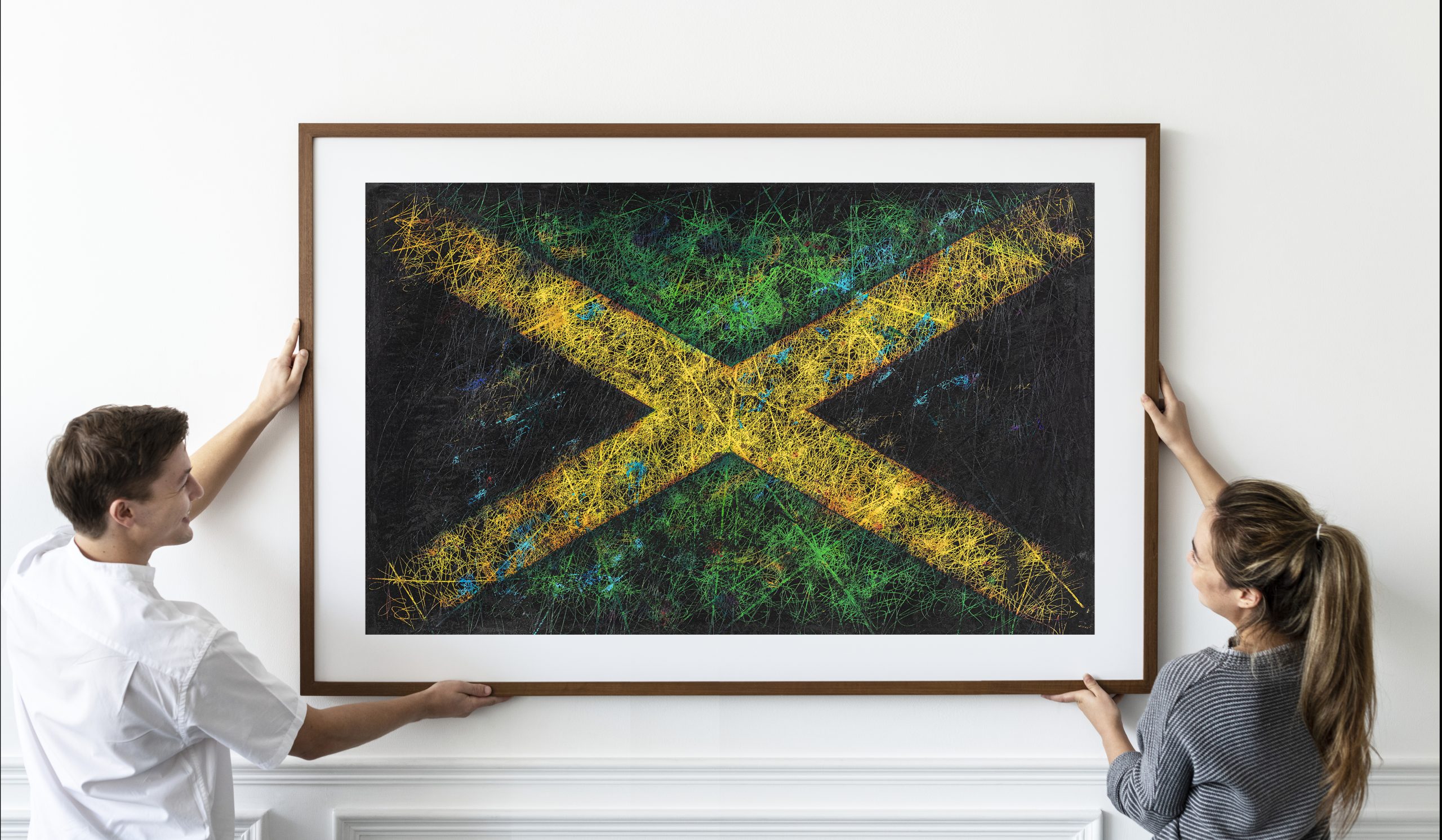 Framed Flag of Jamaica being hung by a couple Framed Flag of Jamaica being hung by a couple